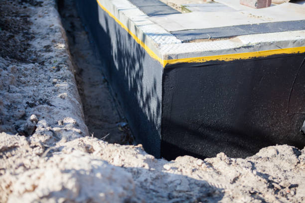 Professional Interior Drainage System technician working in Arcade, GA
